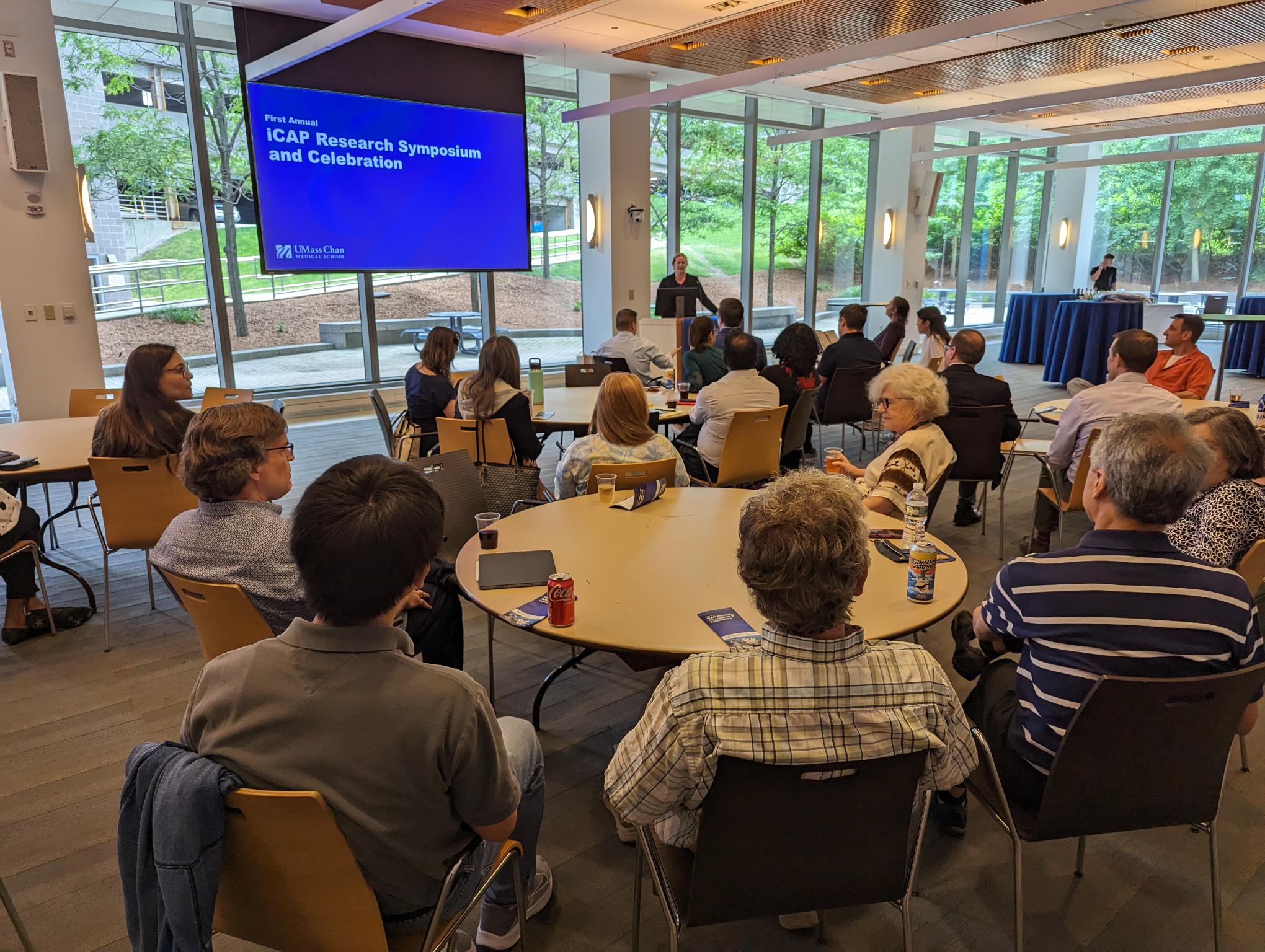 Dr. Kate Fitzgerald delivers opening remarks for the iCAP research symposium and celebration