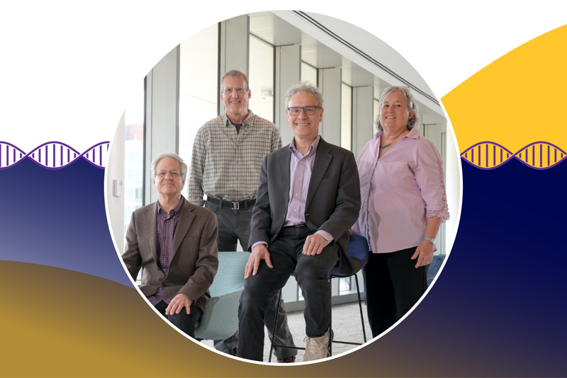 A photo of RNA Therapeutics Institute founders Phil Zamore, Craig Mello, Victor Ambros and Melissa Moore. They are standing in a hallway in the Paul J. DiMare Center. Zamore and Ambors are seated in the foreground, with Mello and Moore standing behind them.