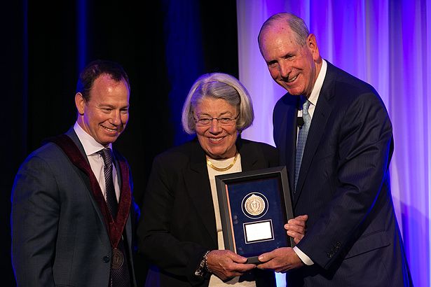 Lawrence M. Rhein, MD, MPH, is invested as the Stoddard Chair of Pediatrics by Judith King and Chancellor Collins.