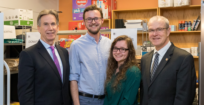 Celebrating the dedication of the Max Baker Resource Center are (from left) James Baker, MD, MPH; Ryan Barrette, SOM ’21; Katherine Sadaniantz, SOM ’21; and Terence Flotte, MD. 