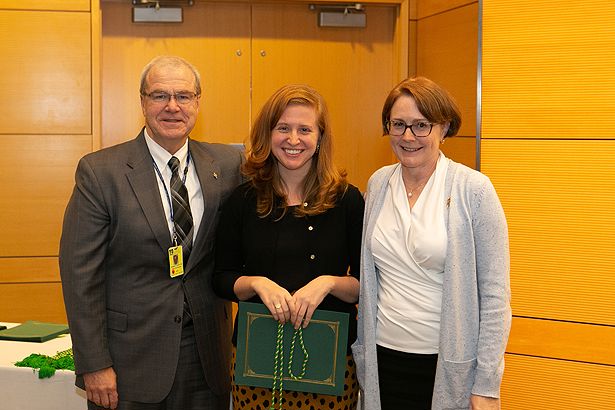 Anna Klouda, SOM ’20, is inducted by Dean Flotte and Dr. Chimienti.