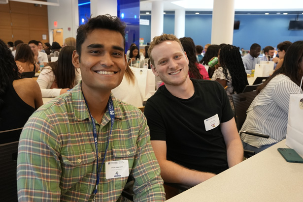 Medical students Faheem Nagpurwala and Avery Pullman enjoy lunch.