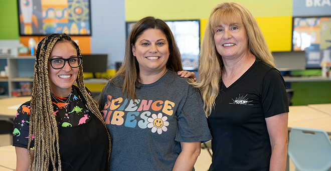 Teachers Christina Faria, Chiara Ramos and Justine Wahlstrom standing together