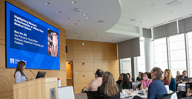 Group gathered in a conference room for the Women’s Faculty Committee Awards presentation